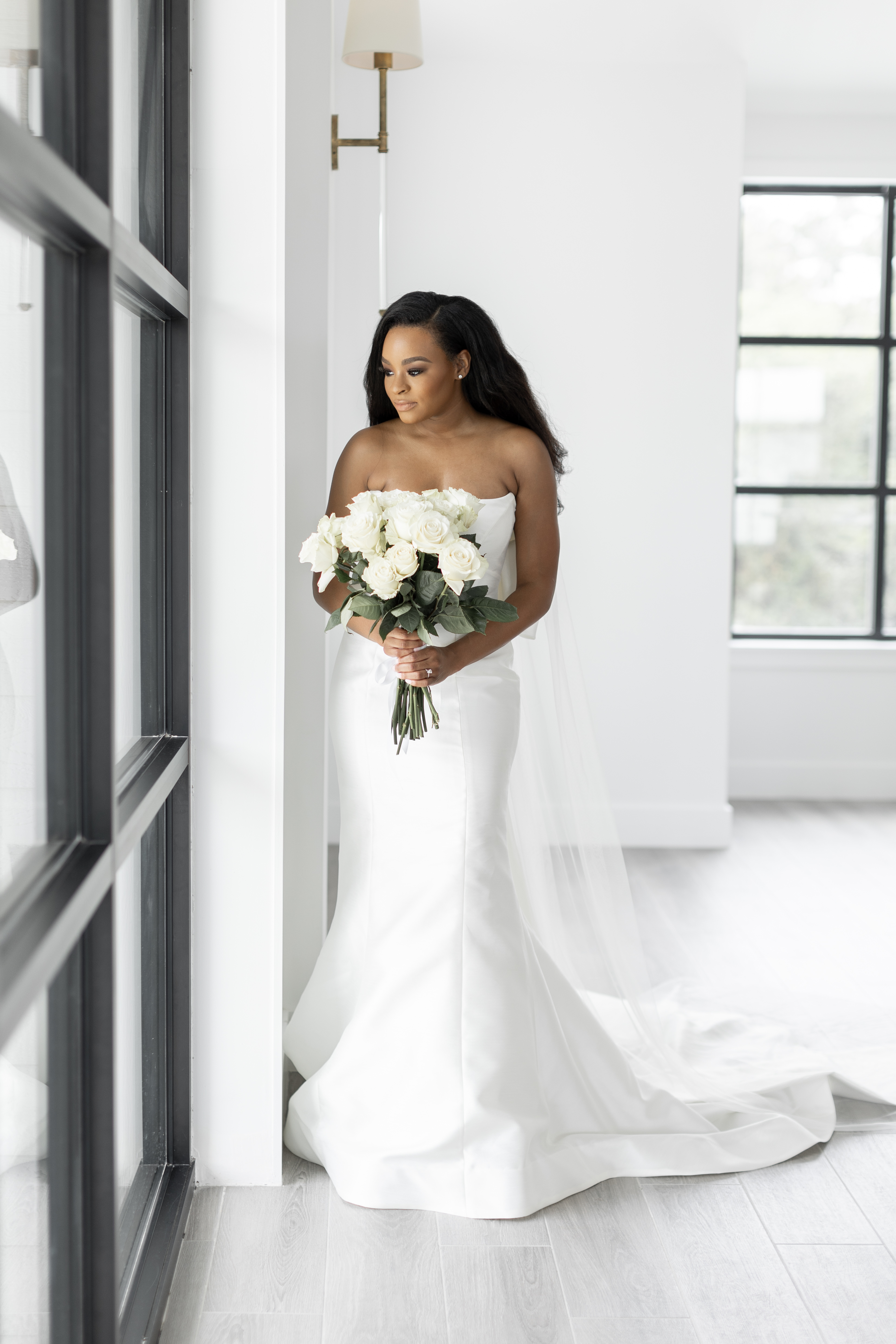 Styl'd Grace Blogger Brittainy Lemelle shares her bridal portraits - photo of the bride holding her bouquet